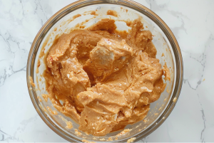 Raw fish fillets being marinated in batter preparation for frying for Fish Nuggets recipe